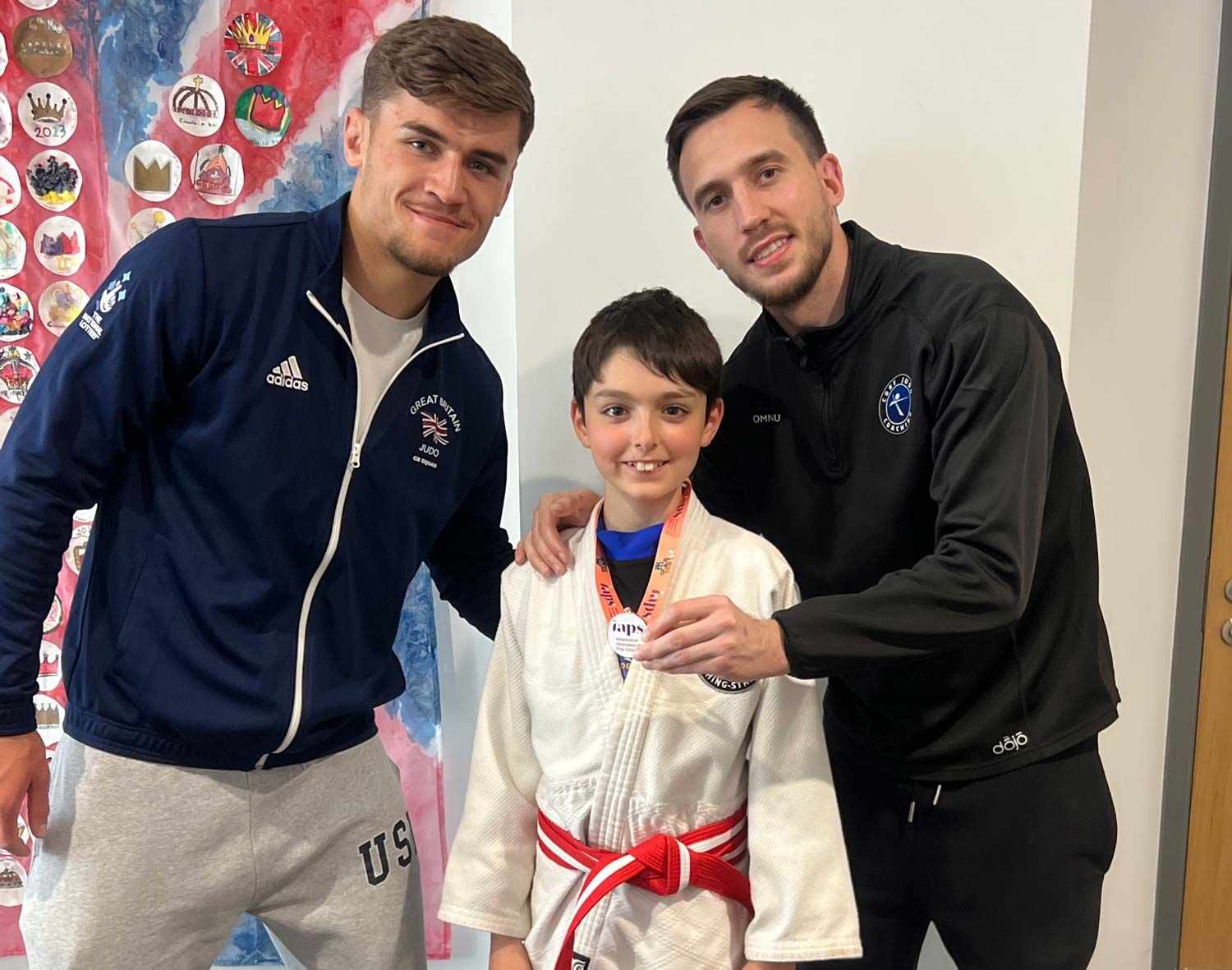 Joshua from Core Judo Staines receiving his bronze medal at the IAPS National Judo Tournament
