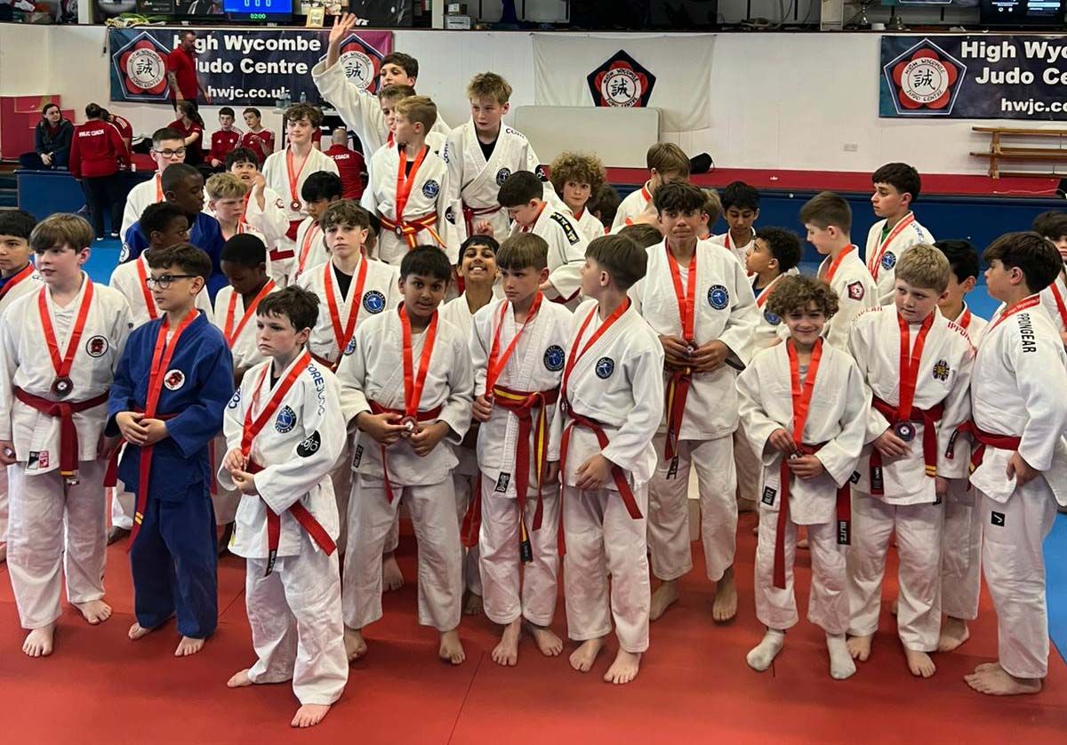 Core Judo Staines junior team celebrating medal wins at High Wycombe Red Belt Rumble