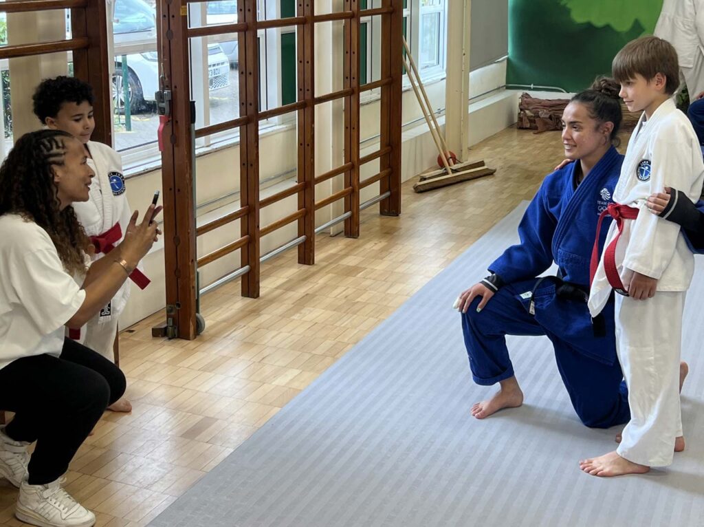 Paris Olympian Lele demonstrates Judo techniques to young athletes at Core Judo.
